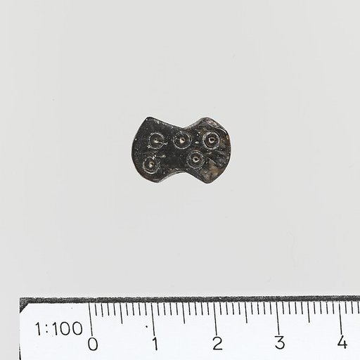 Steatite seal in the form of a double-axe