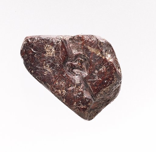 Steatite block with intaglio motifs