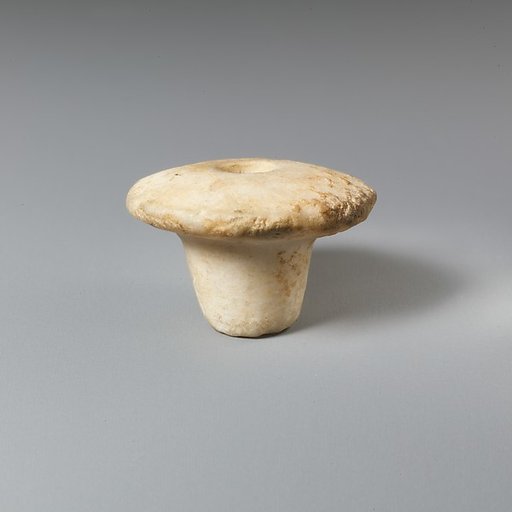 Ivory spindle whorl