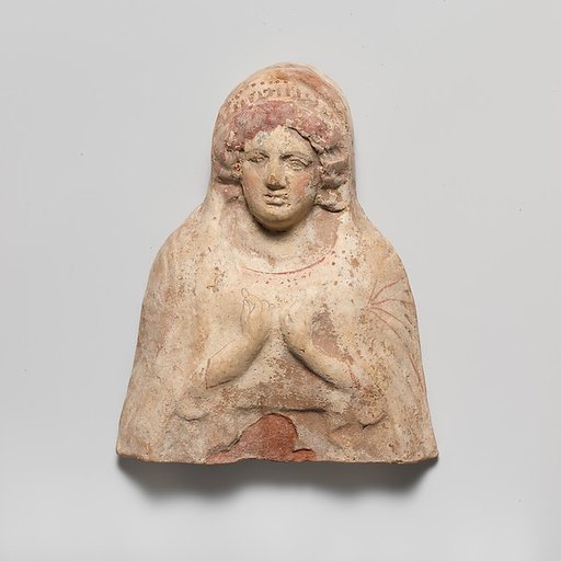 Terracotta relief bust of a woman