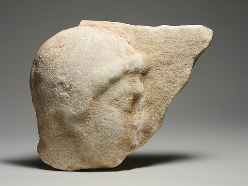 Marble relief fragment with the head of a youth