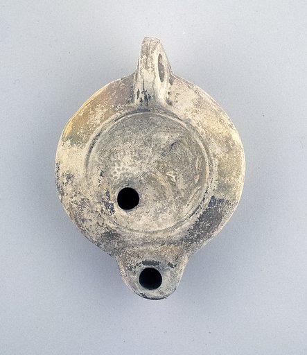 Terracotta oil lamp