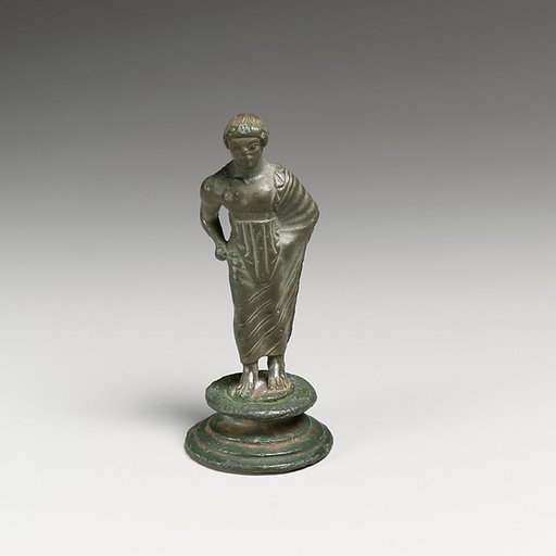 Bronze statuette of a draped youth