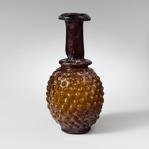 Glass bottle shaped like a bunch of grapes