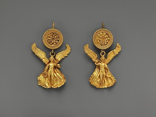 Pair of gold earrings with a disk and Eros