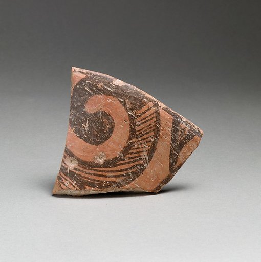 Terracotta rim fragment with spiral design