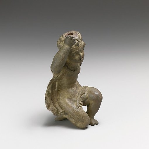 Bronze statuette of Eros kneeling