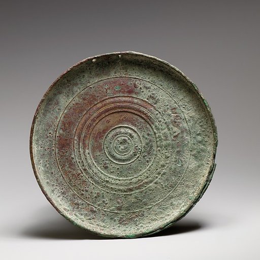 Part of a bronze box mirror