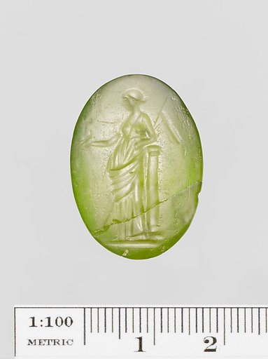 Green glass oval engraved on both sides