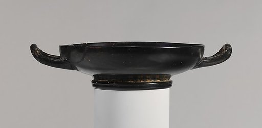 Terracotta stemless kylix (drinking cup)