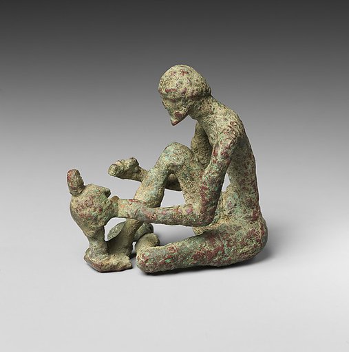 Bronze armorer working on a helmet