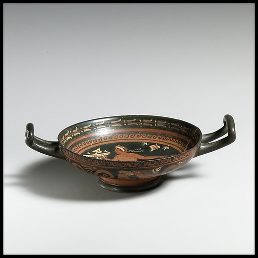 Terracotta stemless kylix (drinking cup)