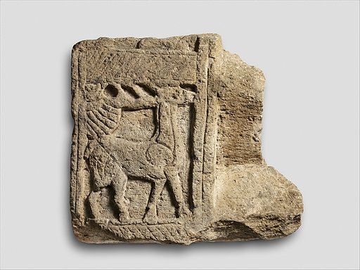 Nenfro tomb-slab fragment