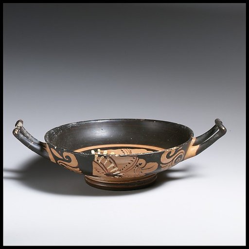 Terracotta stemless kylix (drinking cup)