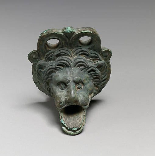 Bronze spout in the form of a lion's head
