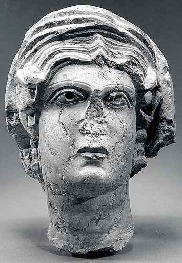 Marble female head from a relief
