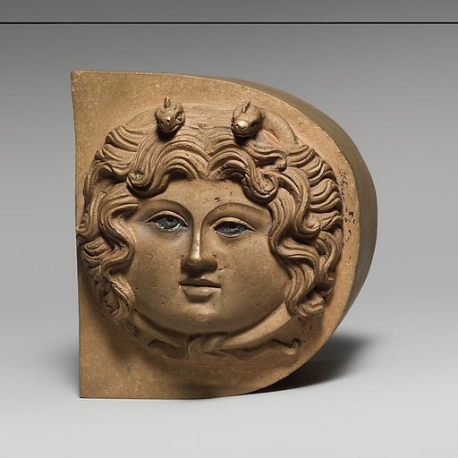 Bronze finial with the head of Medusa