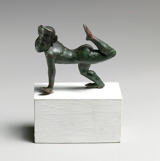 Bronze statuette of  a satyr dancing