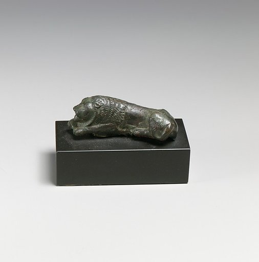 Bronze statuette of a recumbent lion