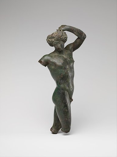 Bronze statuette of a youth dancing