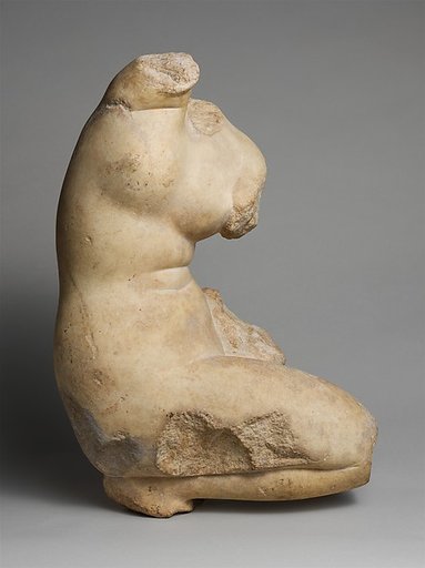 Marble statue of Aphrodite crouching and arranging her hair