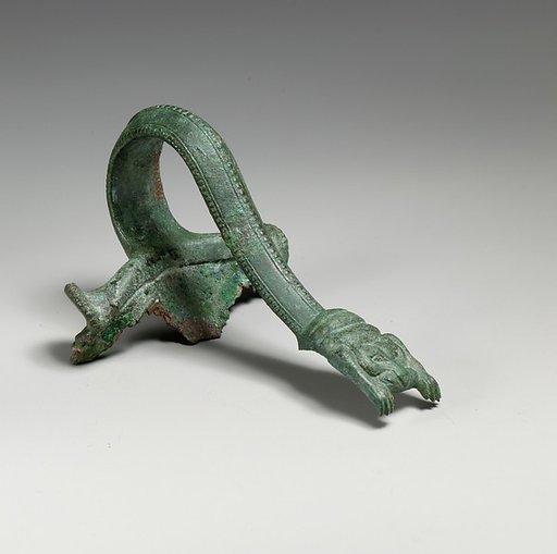 Bronze handle of an oinochoe (jug)