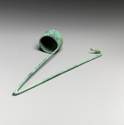 Bronze kyathos (ladle) terminating in a duck's head