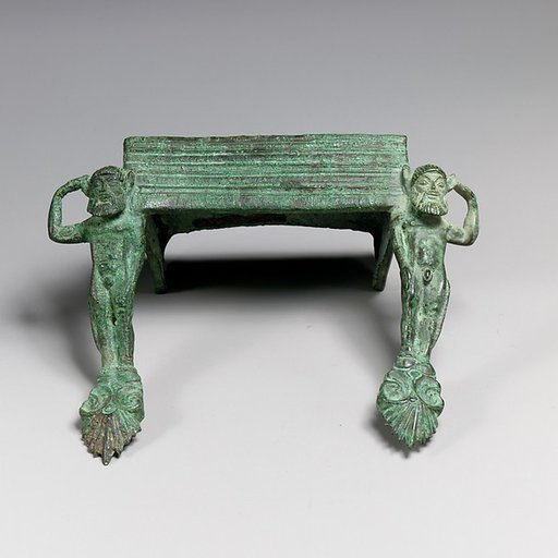 Pair of bronze handles with satyrs