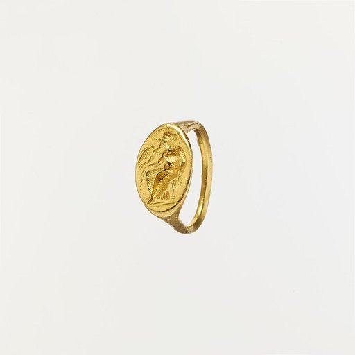 Gold ring with intaglio of seated woman and flying Eros