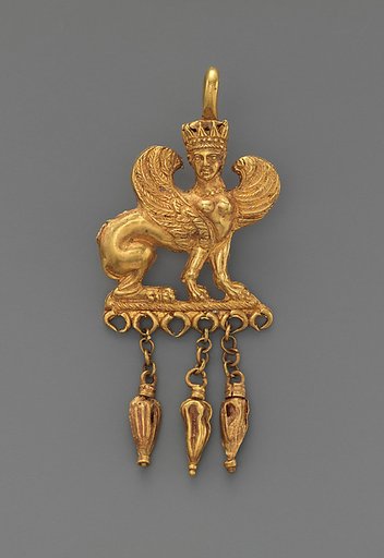 Gold earring with a sphinx