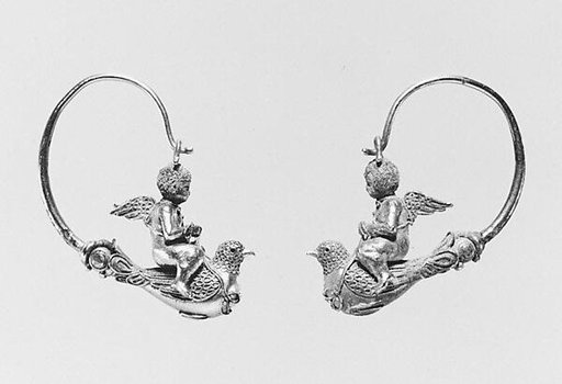 Pair of gold hoop earrings with Erotes riding doves