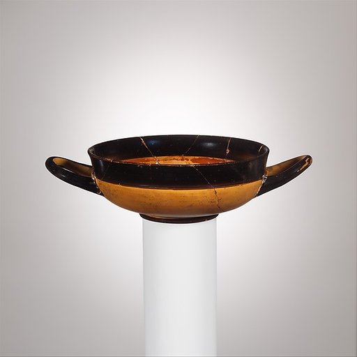 Terracotta stemless kylix (drinking cup)