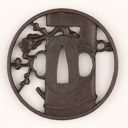 Sword Guard (<i>Tsuba</i>) Depicting Bamboo Vase for <i>Ikebana</i> and Plum Branch