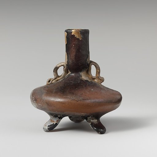 Glass bottle with three feet