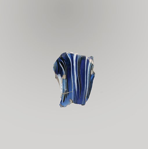 Glass mosaic ribbed bowl fragment