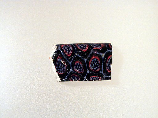 Glass mosaic carinated bowl fragment