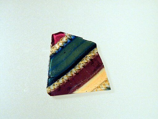 Glass striped mosaic bowl fragment
