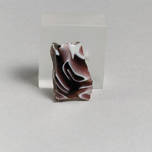Glass mosaic ribbed bowl fragment