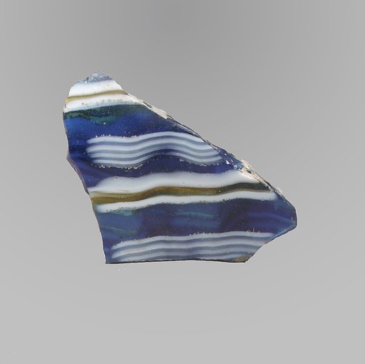 Glass mosaic ribbed bowl fragment