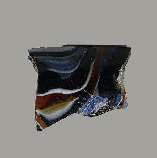 Glass mosaic ribbed bowl fragment