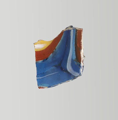 Glass mosaic ribbed bowl fragment