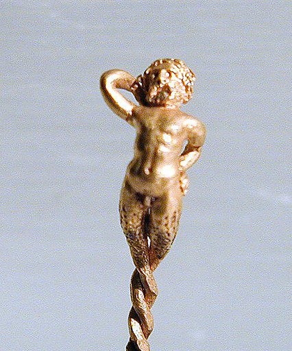 Gold earring in the form of a bearded satyr or triton