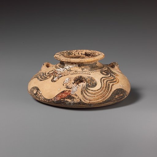 Terracotta squat alabastron (jar)