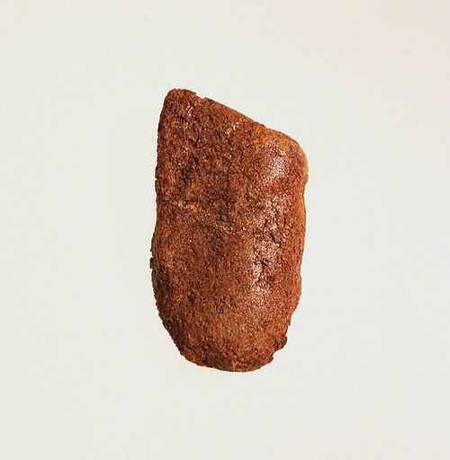 Pendant: head of a woman