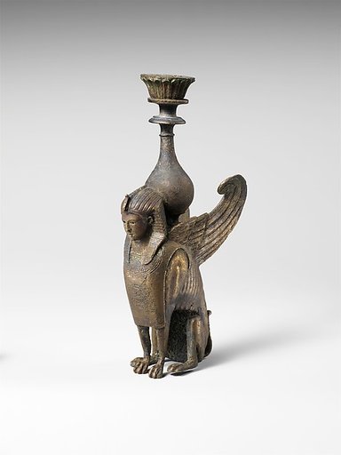Bronze ornament in the form of a seated male sphinx