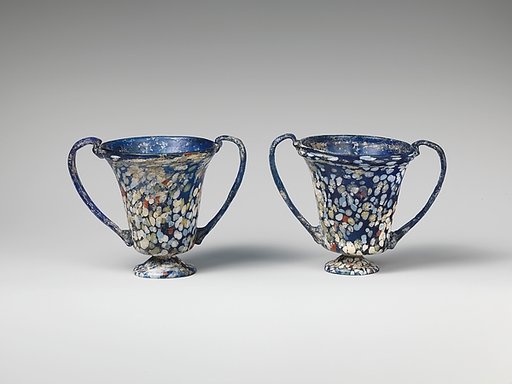 A pair of glass drinking cups