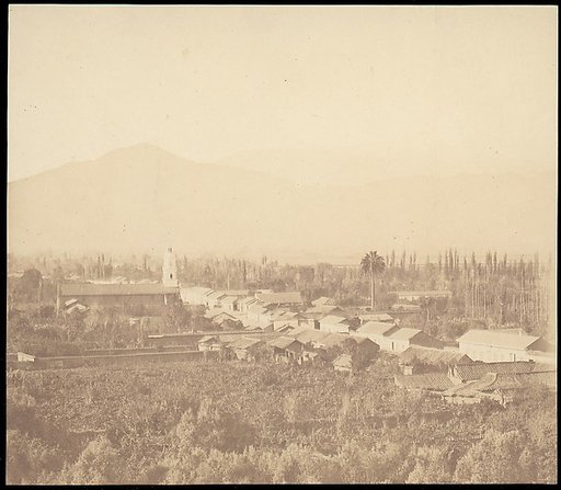 [Town on Plain with Mountain in Background]