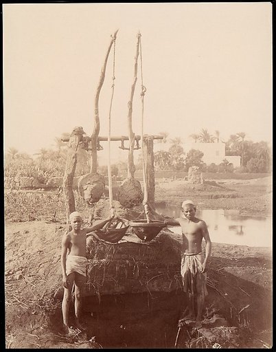 [Two Boys Beside a Well]