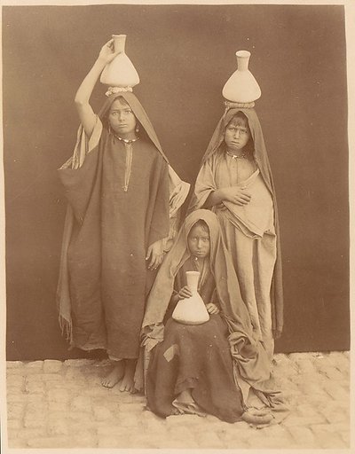 [Arab Girls Carrying Water]
