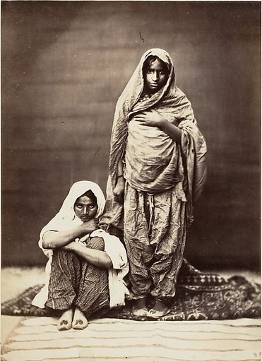 [Two Indian Women, One Seated]